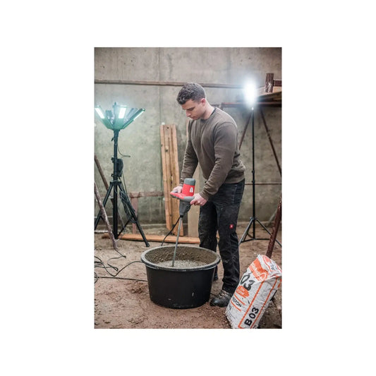 TECMIX Rührwerk TMX PRO 1600 in use for mixing mortar in a construction setting.